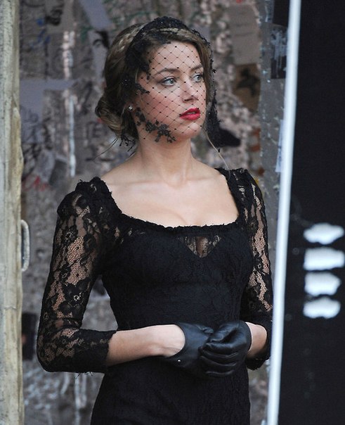 Amber Heard looking absolutely stunning in a veil and black gloves on the set of London Fields